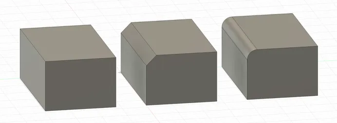 Screenshot of three rectangular prisms in Fusion, one with an angled edge (a chamfer), one with a rounded edge (a fillet).
