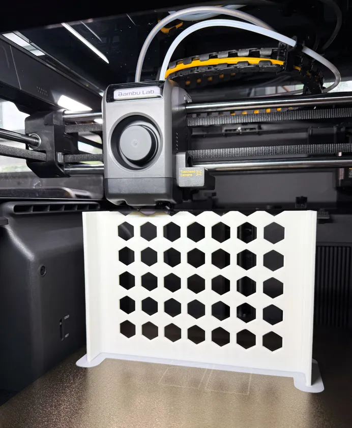 3D print of the divider in progress inside a Bambu Lab X2D printer